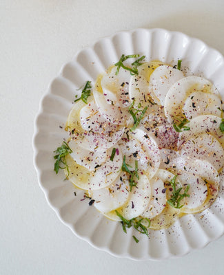Carpaccio von Jakobsmuscheln mit Yuzu