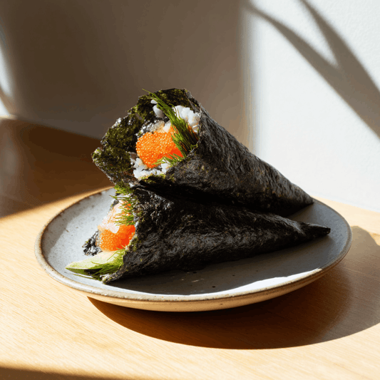 Temaki with fish roe, cucumber, and dill