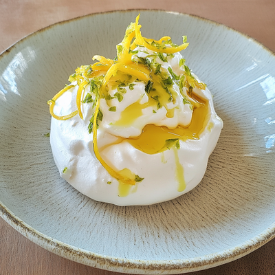 Pavlova with yuzu and shiso