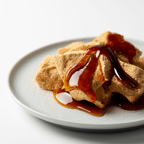 Warabi mochi met kinako en kuromitsu