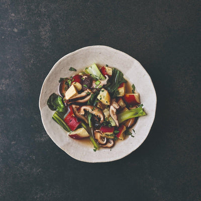 Shiitake en gestoofde zoete aardappelen